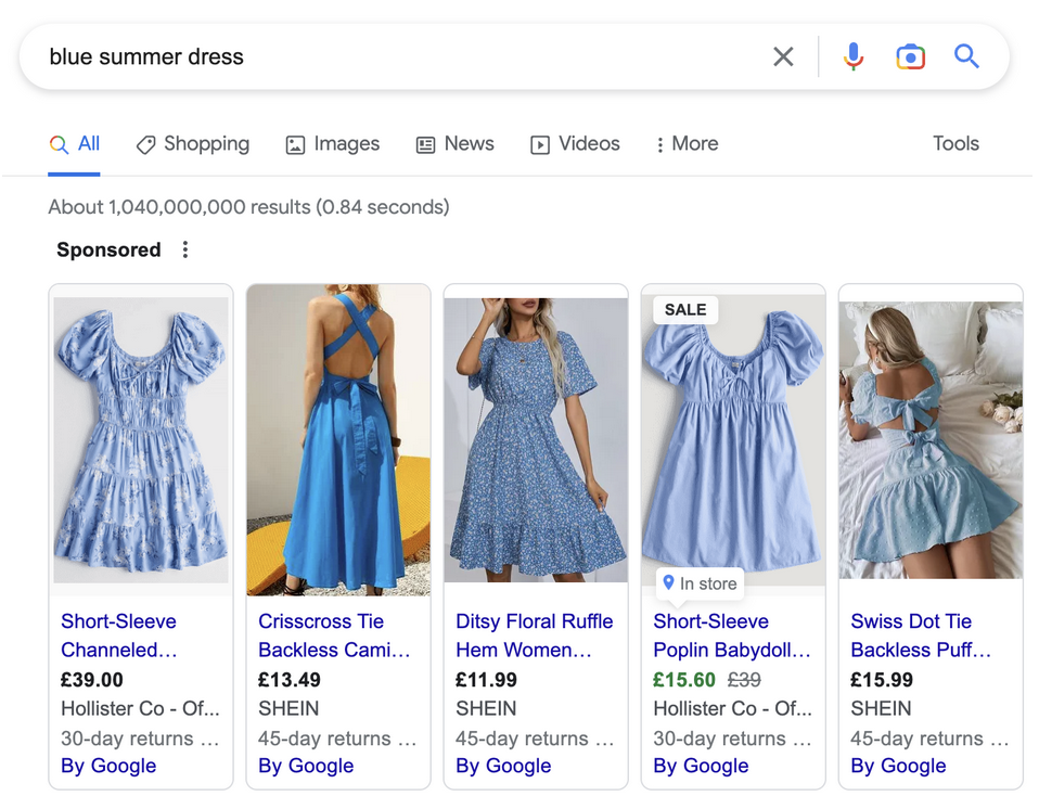 a screen shot of a website listing for blue summer dresses.